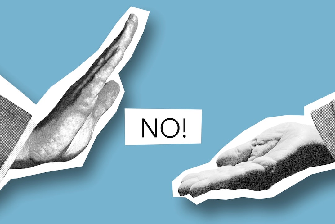 Due mani con un “NO” in mezzo - Foto di Monstera su Pexels